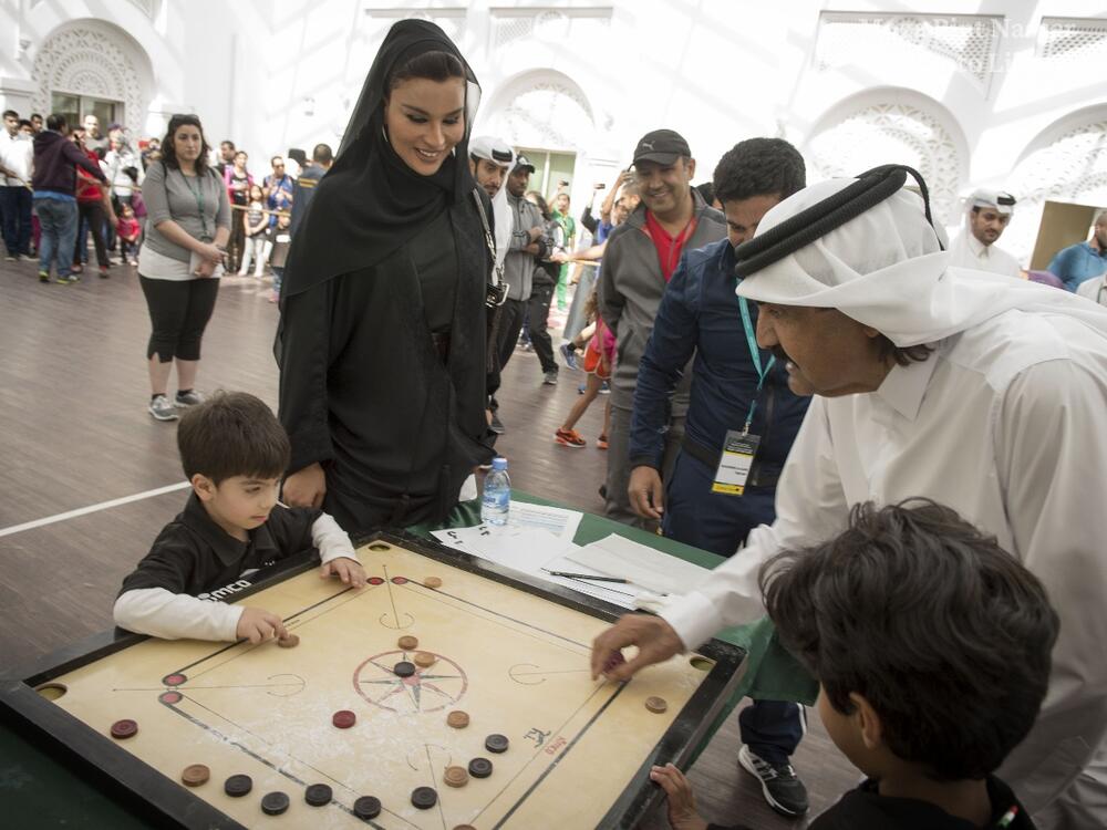 HH Sheikh Hamad Bin Khalifa Al Thani, the father Amir, and HH Sheika Moza Bint Nasser participate in National Sport Day at Qatar Foundation