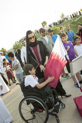 HH Sheikha Moza participates in Al Adaam Flag Relay at Education City