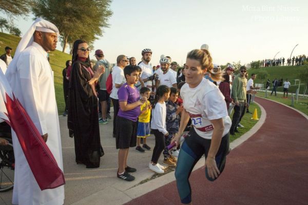 HH Sheikha Moza participates in Al Adaam Flag Relay at Education City